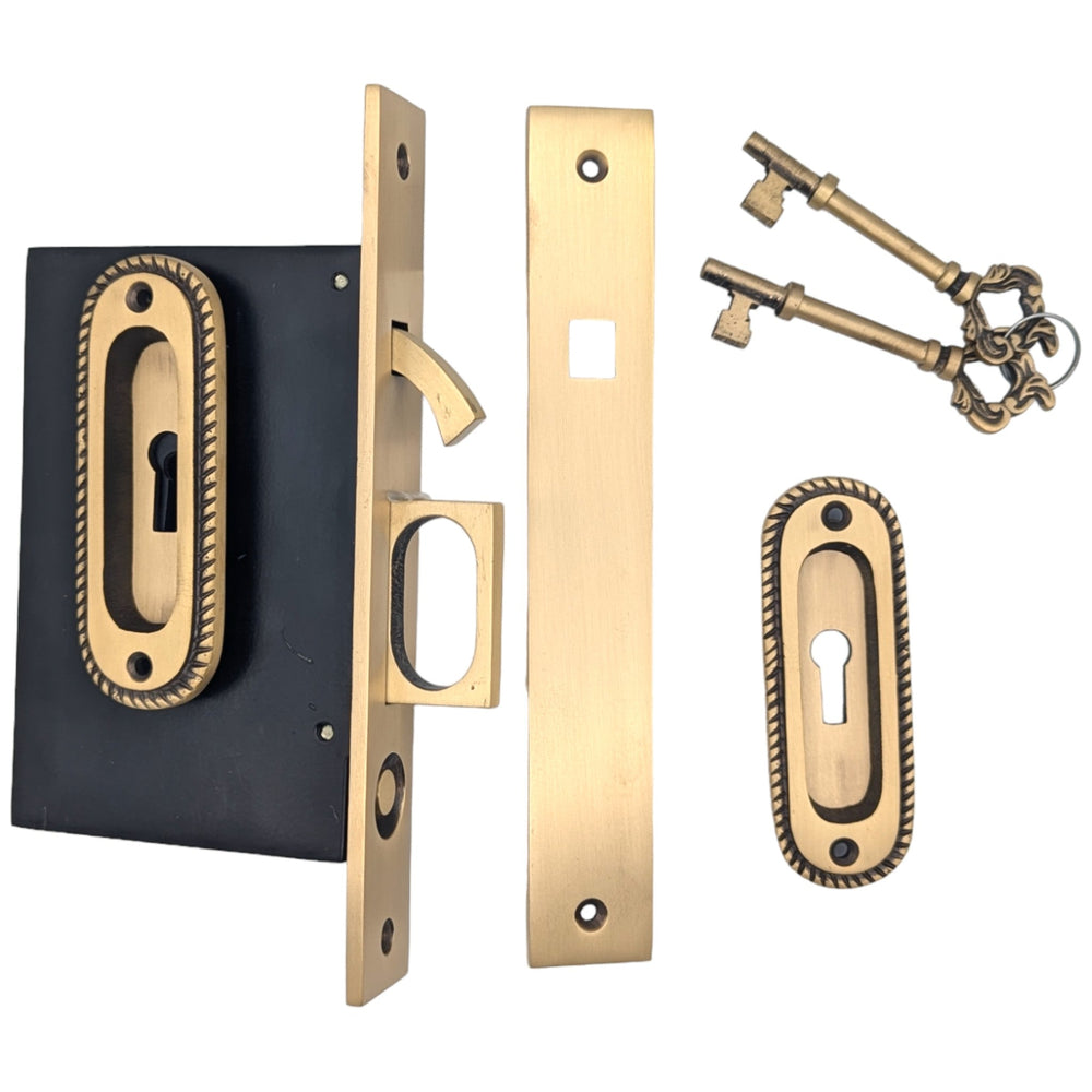 Georgian Oval Pattern Pocket Privacy (Lock) Style Door Set COPPER MOUNTAIN HARDWARE
